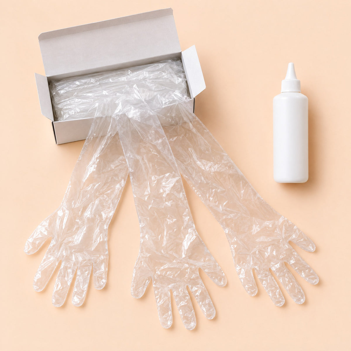 The Kiba Breeding Gloves and Gel Pack: a box of fifty shoulder-length gloves with three fanned out, and a 250 ml bottle of lubricating gel
