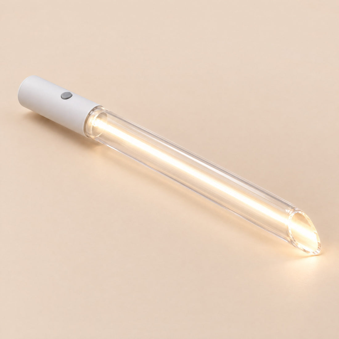 Kiba Beam lighted speculum: a clear acrylic tube lit from the LED handle, the bevelled tip glowing