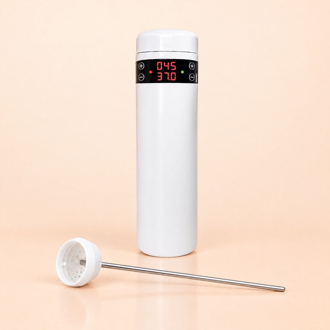 Kiba Thaw 200 ml heated thaw cup with its red display, and the straw basket on its steel rod