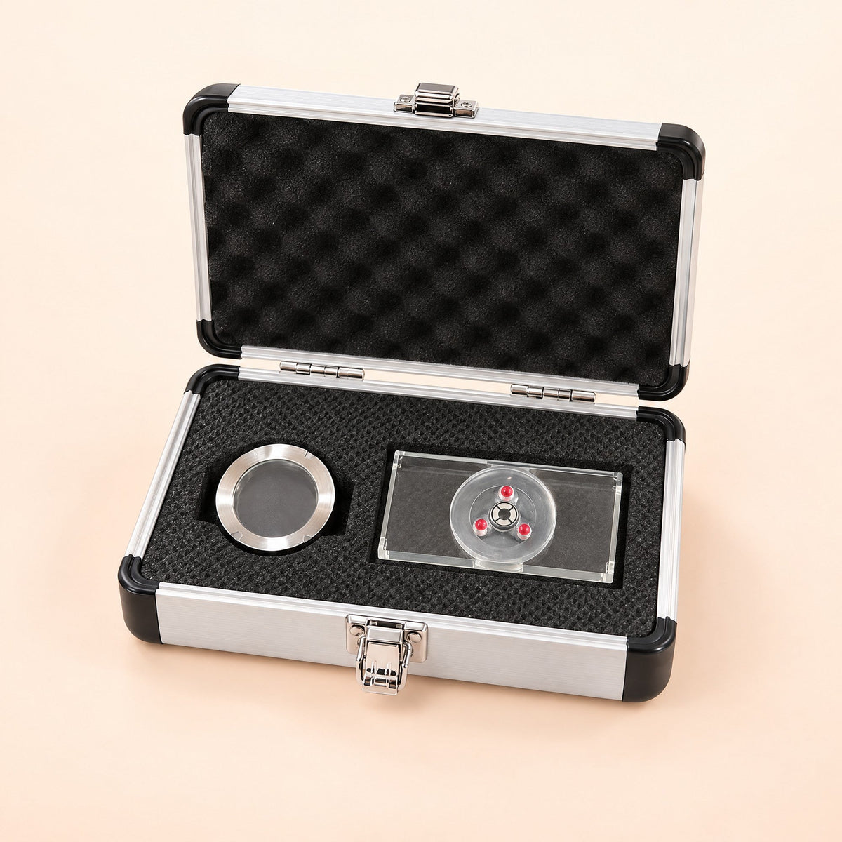 Kiba Count in its open aluminium case, cover ring and chamber in the foam