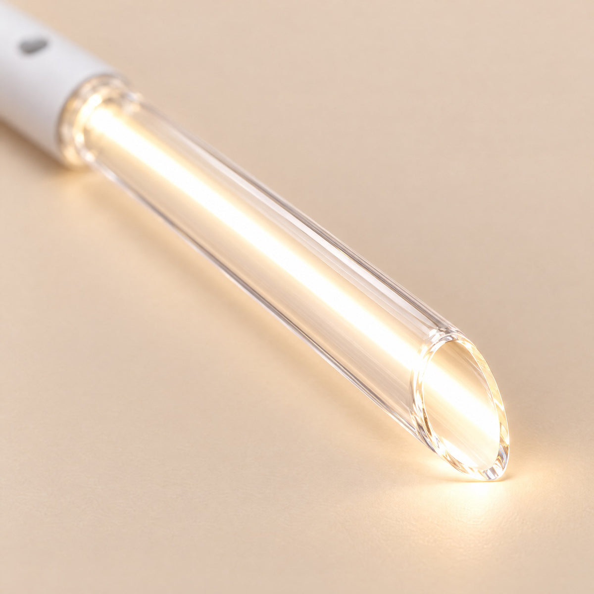 The lit bevelled tip of the Kiba Beam tube, close up