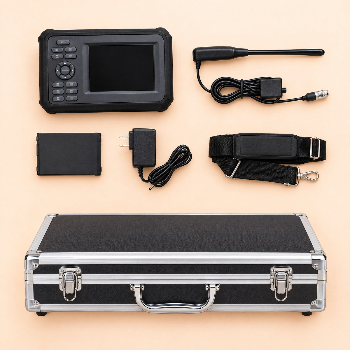 Everything in the Kiba Echo Cattle & Horse box: scanner, rectal probe, battery, charger with US plug, carry strap and aluminium case