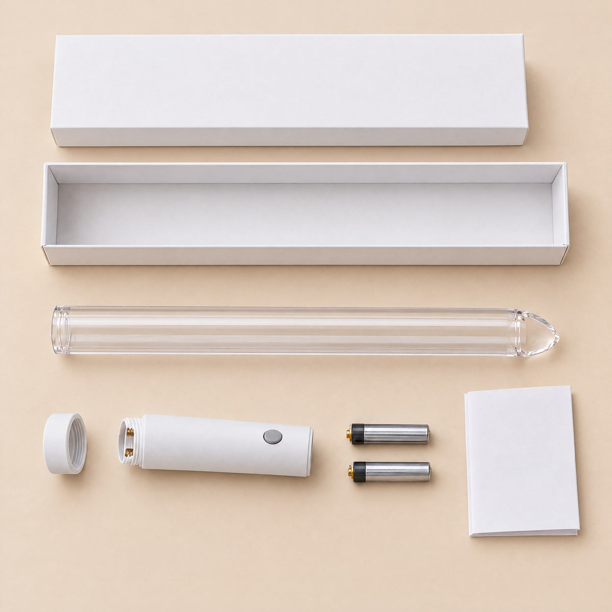 What is in the Kiba Beam box: the clear tube, the LED handle with its end cap off, two batteries and the instruction leaflet