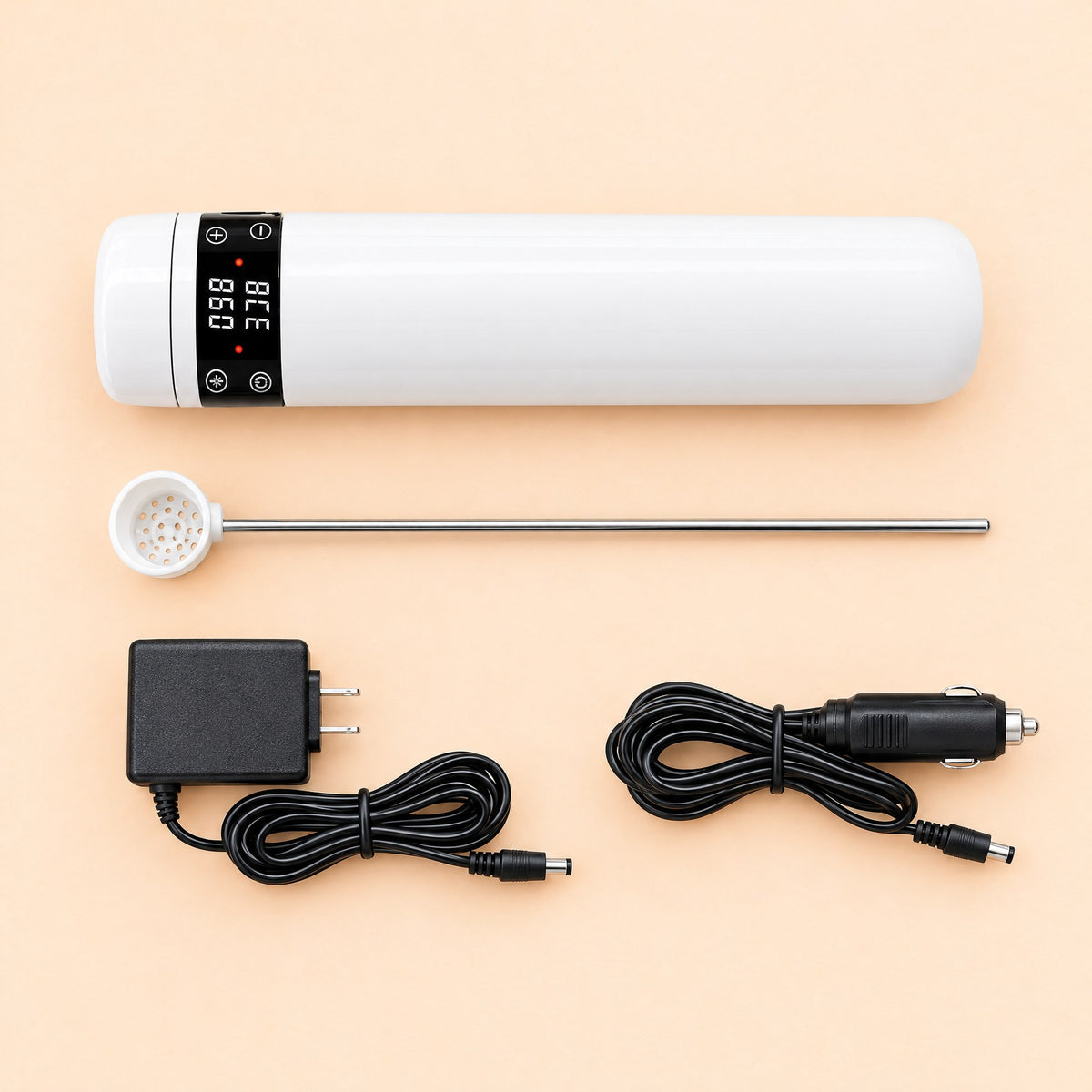 What is in the Kiba Thaw box: the cup, the straw basket on its rod, a mains adapter with a US plug and a 12 V vehicle lead