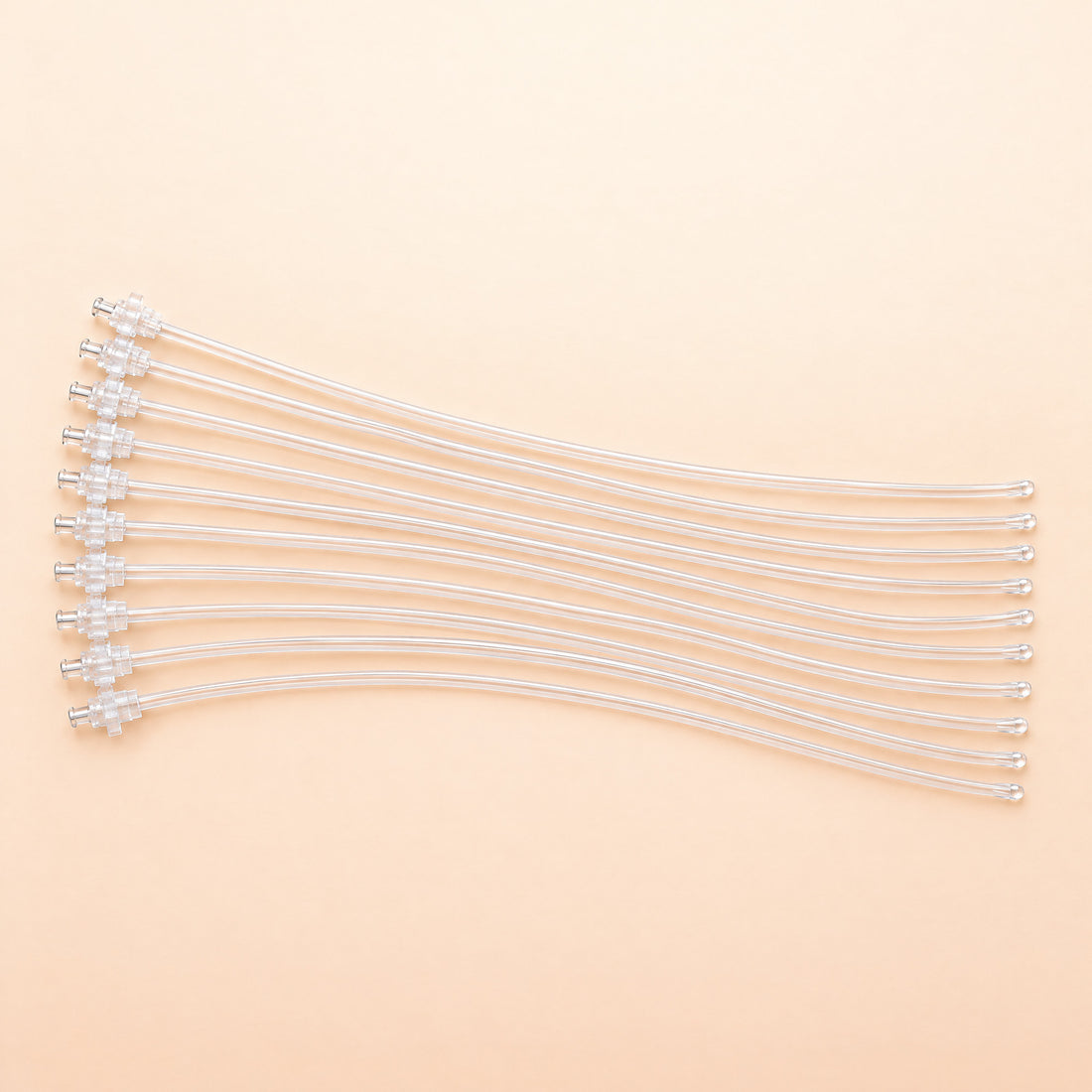 Ten Kiba Scope insemination tubes, 46 cm, each with a clear syringe fitting and a rounded end