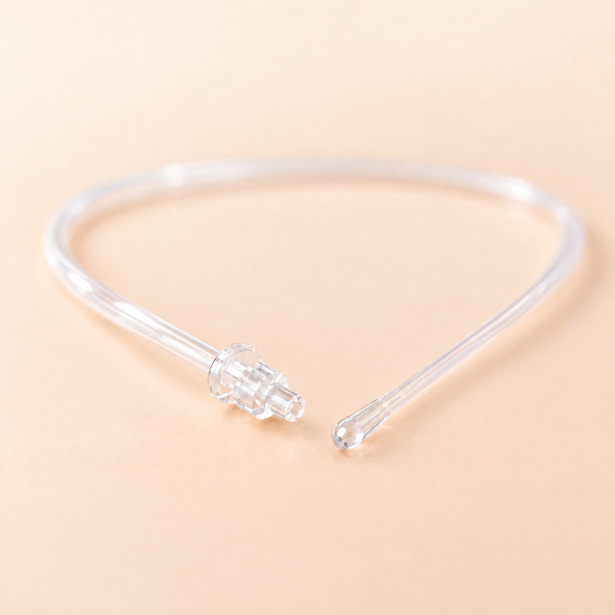 Both ends of a Kiba Scope tube: the clear syringe fitting and the smooth rounded tip