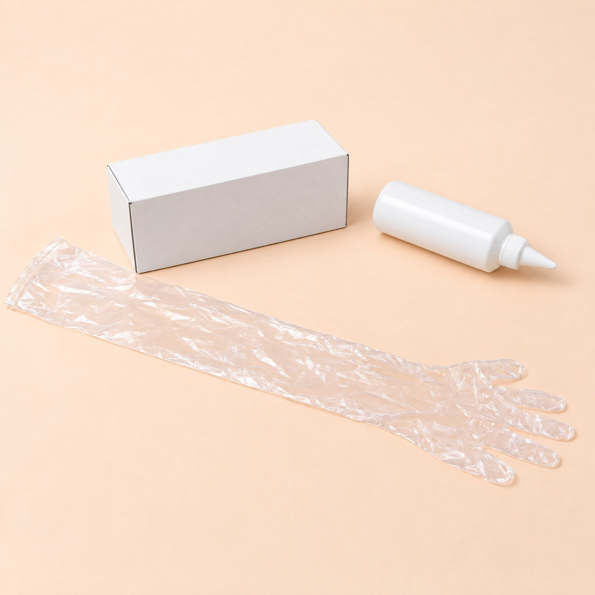 What is in the pack: the box of 50 shoulder-length gloves, one glove at its full length, and the 250 ml bottle of water-based gel