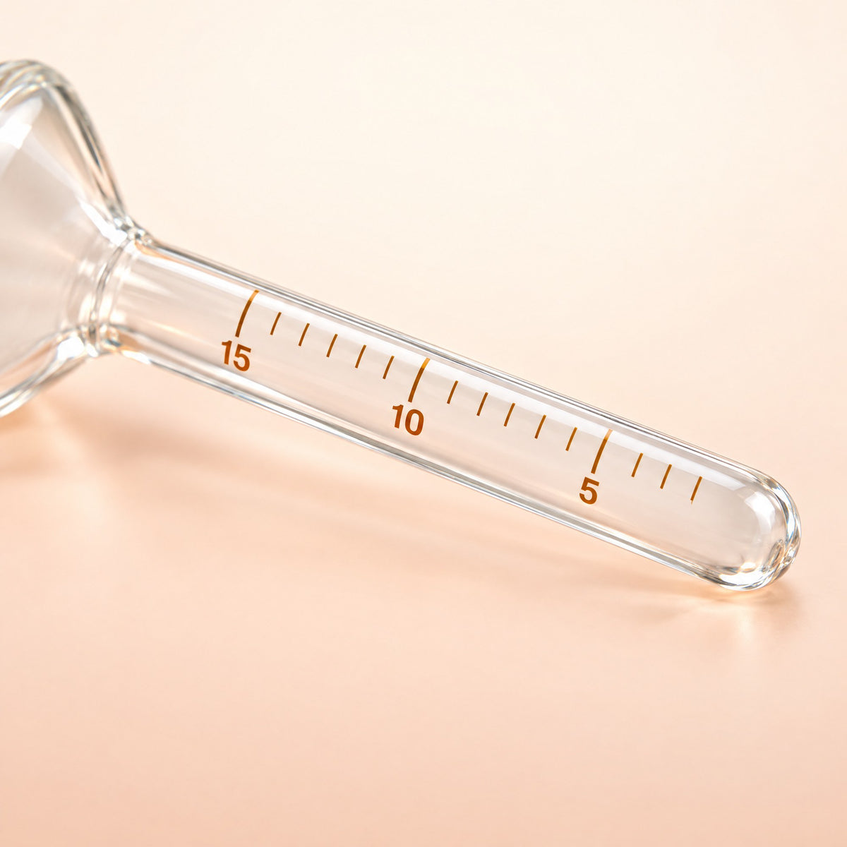 Close-up of the printed scale on the glass tube of the Kiba Collection Cup