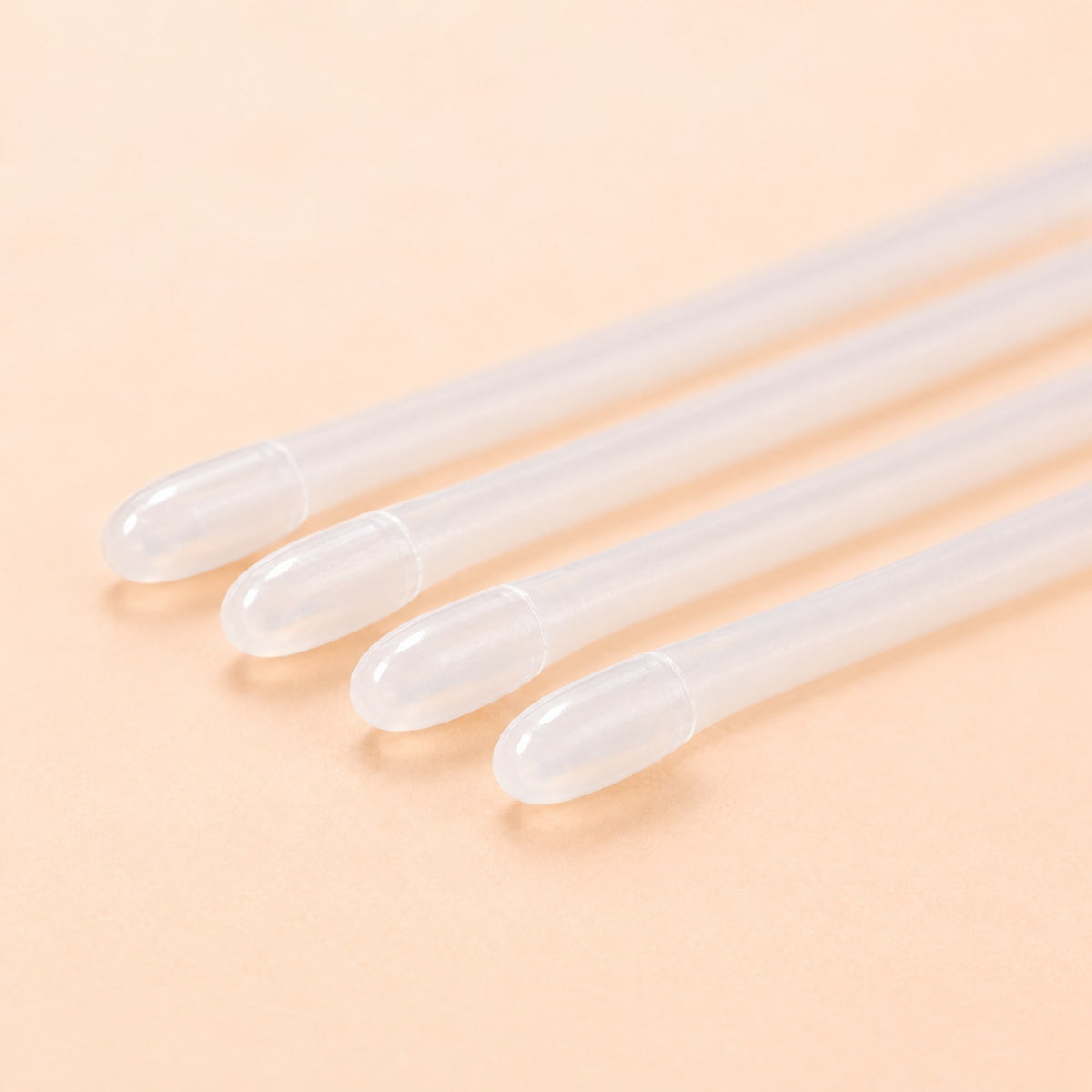 Close view of the smooth rounded tips of four Kiba Scope Cattle sheaths